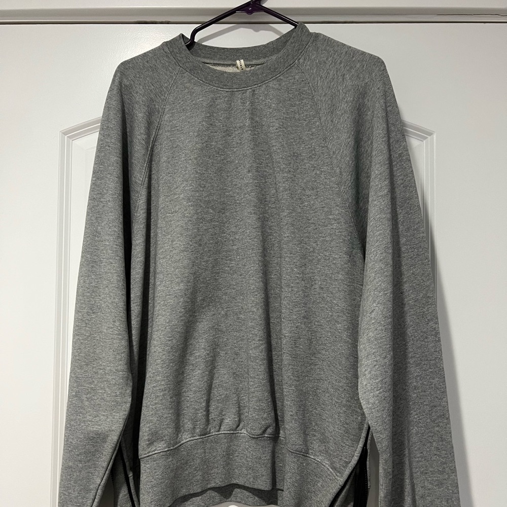 Fear Of God Crewneck with side zippers.